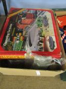 Box of assorted Hornby and other 00 gauge rolling stock, mostly unboxed together with track and