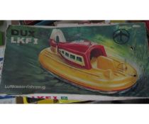 Boxed 1960s Dux LKF1 Luftkissenfaharzeug German remote control hovercraft toy, length approx 34cm,