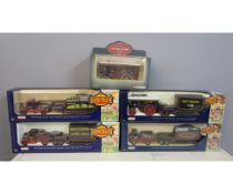 Four boxed various Lledo Showman’s Series fun fair die-cast lorries together with a Corgi vintage