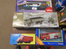 Four various boxed die-cast military and commercial vehicles to include Corgi Classics British