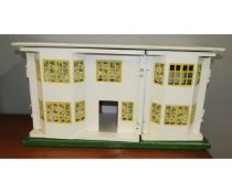 Small circa 1930s/40s wood and tin plate doll’s house