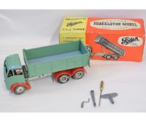 Boxed Shackleton mechanical (die-cast and tin) model of a Foden FG6 tipper, approx 11cm, in original