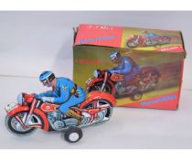 Late C20thTurkish tinplate model of a Motorcycle and Rider by Mekanik, approx length 6" (bxd)