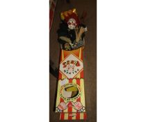 Two boxed Pelham puppets, one formed as a witch, the other as a clown