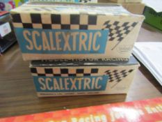 Boxed vintage Scalextric model car, Porsche C86 plus a spare, both boxed