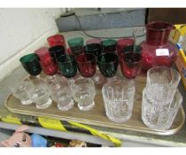 TRAY CONTAINING MIXED GLASS WARES TO INCLUDE GREEN AND CRANBERRY WINE GLASSES, FURTHER CRANBERRY JUG