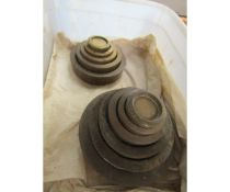 TWO GRADUATED SETS OF BRASS WEIGHTS