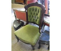 VICTORIAN MAHOGANY FRAMED NURSING CHAIR WITH GREEN UPHOLSTERY AND BUTTON BACK WITH TURNED FRONT LEGS