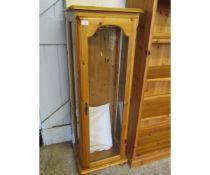 STAINED PINE FRAMED THREE-GLASS DISPLAY CABINET WITH ADJUSTABLE SHELVES RAISED ON BUN FEET