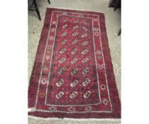 GOOD QUALITY MODERN BOKHARA TYPE CARPET WITH RED GROUND AND REPEATED LOZENGE CENTRE