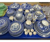 LARGE QUANTITY OF WILLOW PATTERN BLUE AND WHITE PRINTED WARES TO INCLUDE PLATES, TUREENS, BOWLS,