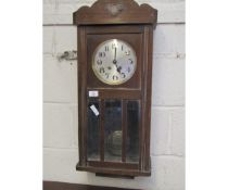 MID-CENTURY WALNUT FRAMED CLOCK WITH SILVERED DIAL WITH GLASS DOOR