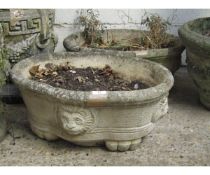 PAIR OF CONCRETE LOBED PLANTERS