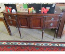 GEORGIAN MAHOGANY BOW FRONTED SIDEBOARD FITTED CENTRALLY WITH TWO CUPBOARD DOORS FLANKED EITHER SIDE