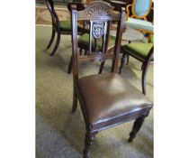 SET OF FOUR VICTORIAN WALNUT CARVED BACK DINING CHAIRS WITH BROWN REXINE COVERED SEATS AND TURNED