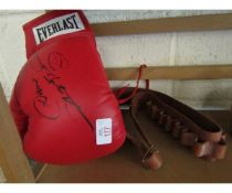 EVERLAST SIGNED BOXING GLOVE AND A FURTHER CARTRIDGE BELT