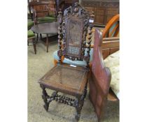 VICTORIAN GOTHIC OAK HALL CHAIR WITH HEAVY CARVINGS WITH BARLEY TWIST SUPPORTS WITH CANE SEAT AND