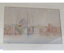 WATERCOLOUR SIGNED HERIE OF AN EASTERN SCENE IN A GILT FRAME