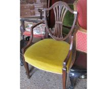 MAHOGANY SHIELD BACK ARMCHAIR WITH YELLOW UPHOLSTERY ON TAPERING SQUARE SPADE FEET