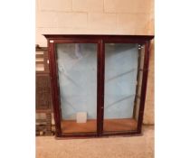 19TH CENTURY STAINED PINE CABINET WITH TWO GLAZED DOORS WITH ADJUSTABLE SHELVES