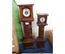 TWO SMALL OAK FRAMED APPRENTICE TYPE LONG CASE CLOCKS