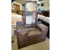 OAK GOTHIC TYPE DROP CENTRE DRESSING CHEST WITH TWO OVER TWO FULL WIDTH DRAWERS WITH CARVED FRONTS