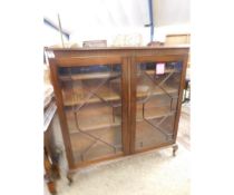 MAHOGANY FRAMED ASTRAGAL GLAZED DOUBLE DOOR BOOKCASE RAISED ON PAD FEET