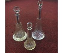 GROUP OF THREE LATE 19TH EARLY 20TH CENTURY CRYSTAL AND SILVER TOPPED PERFUME BOTTLES