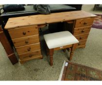 PINE FRAMED TWIN PEDESTAL DRESSING TABLE WITH EIGHT DRAWERS WITH TURNED KNOB HANDLES AND UPHOLSTERED