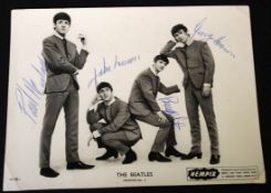 The Beatles group photograph, published Nempix [1963] "Nempose No 2", bears signatures of all four