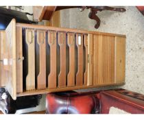 OAK FRAMED NARROW TAMBOUR FRONTED CABINET WITH PULL OUT SLIDES