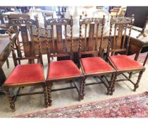 SET OF FOUR OAK FRAMED BARLEY TWIST DINING CHAIRS WITH RED DRALON DROP IN SEATS