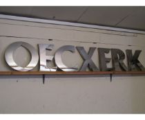 GROUP OF SEVEN STAINLESS STEEL LETTERS