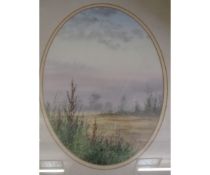 K WALTON OVAL FRAMED WATERCOLOUR OF A LANDSCAPE SCENE