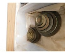 TWO GRADUATED SETS OF BRASS WEIGHTS