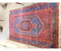 GOOD QUALITY MODERN CARPET IN REDS AND BLUES WITH GEOMETRIC DESIGN