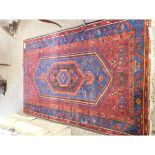 GOOD QUALITY MODERN CARPET IN REDS AND BLUES WITH GEOMETRIC DESIGN