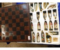 MODERN CHESS BOARD WITH A QUANTITY OF RESIN MILITARY CHESS FIGURES