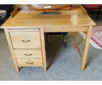 MID-20TH CENTURY OAK FRAMED SINGLE PEDESTAL CLERK S DESK WITH THREE DRAWERS