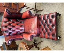 OXBLOOD LEATHER AND BUTTON BACK WING FIRESIDE CHAIR TOGETHER WITH MATCHING FOOT STOOL (2)