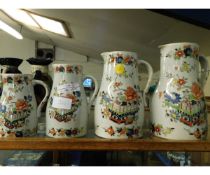 GRADUATED SET OF FOUR VICTORIAN FLORAL PRINTED VASES