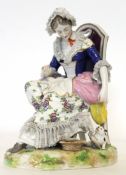 Continental porcelain Naples or Capo di Monte model of a lady seated on a high back chair with cat
