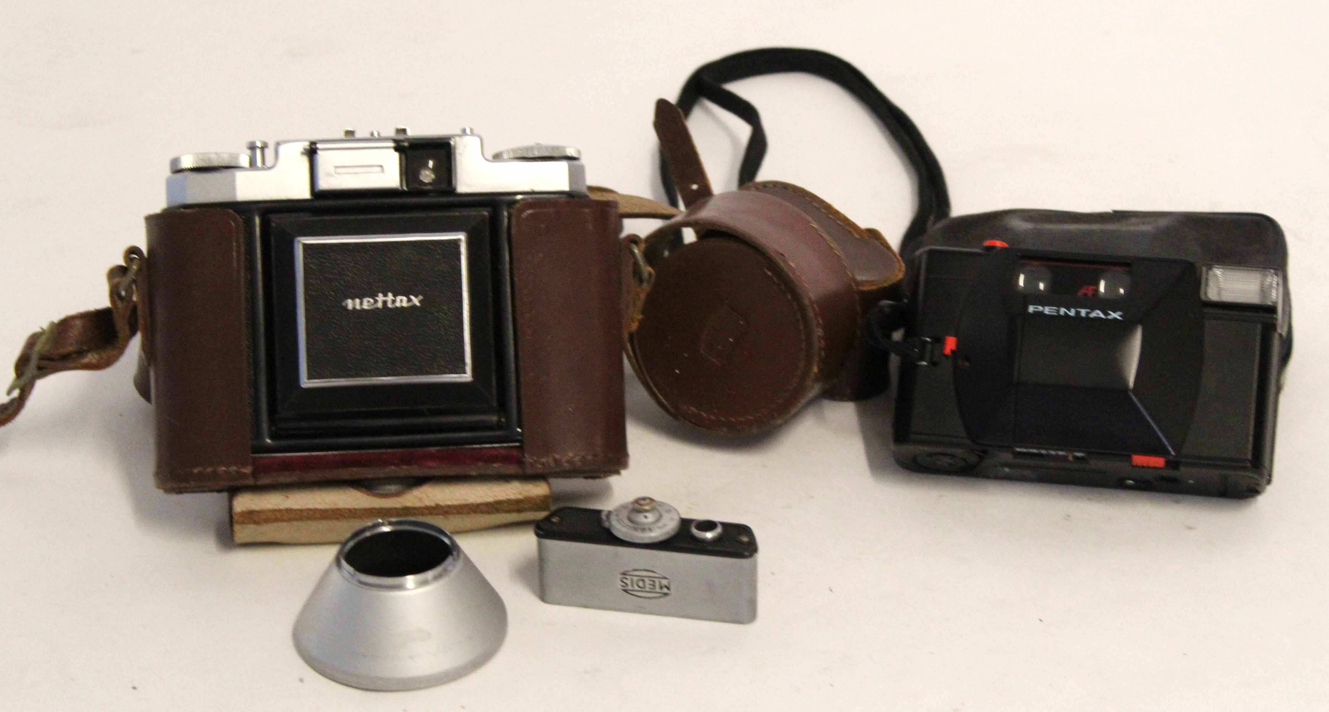 Leather cased Nettax 35mm camera together with a Pentax PC35 AF compact camera (2)