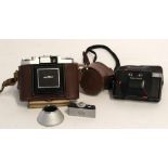 Leather cased Nettax 35mm camera together with a Pentax PC35 AF compact camera (2)