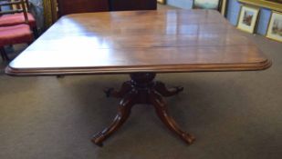 19th century mahogany dining table, rectangular top with moulded edge, raised on baluster pedestal