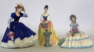 Group of three Royal Doulton figurines including Daydreams and Alexandra, 20cm high