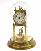 First half of 20th century German brass year going timepiece, 62072, the stepped circular base to