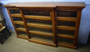 19th century mahogany framed break front bookcase, fitted centrally with four glass sliding doors,