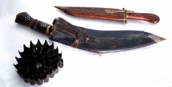 **Mixed Lot: comprising a brass and horn handled Kukri in a leather covered scabbard fitted with two