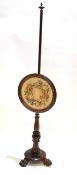 William IV rosewood pole screen with shaped circular screen with garland formed wool work inserted